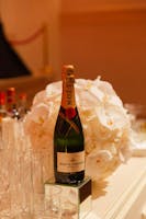 A bottle of champagne by Julie Skarratt