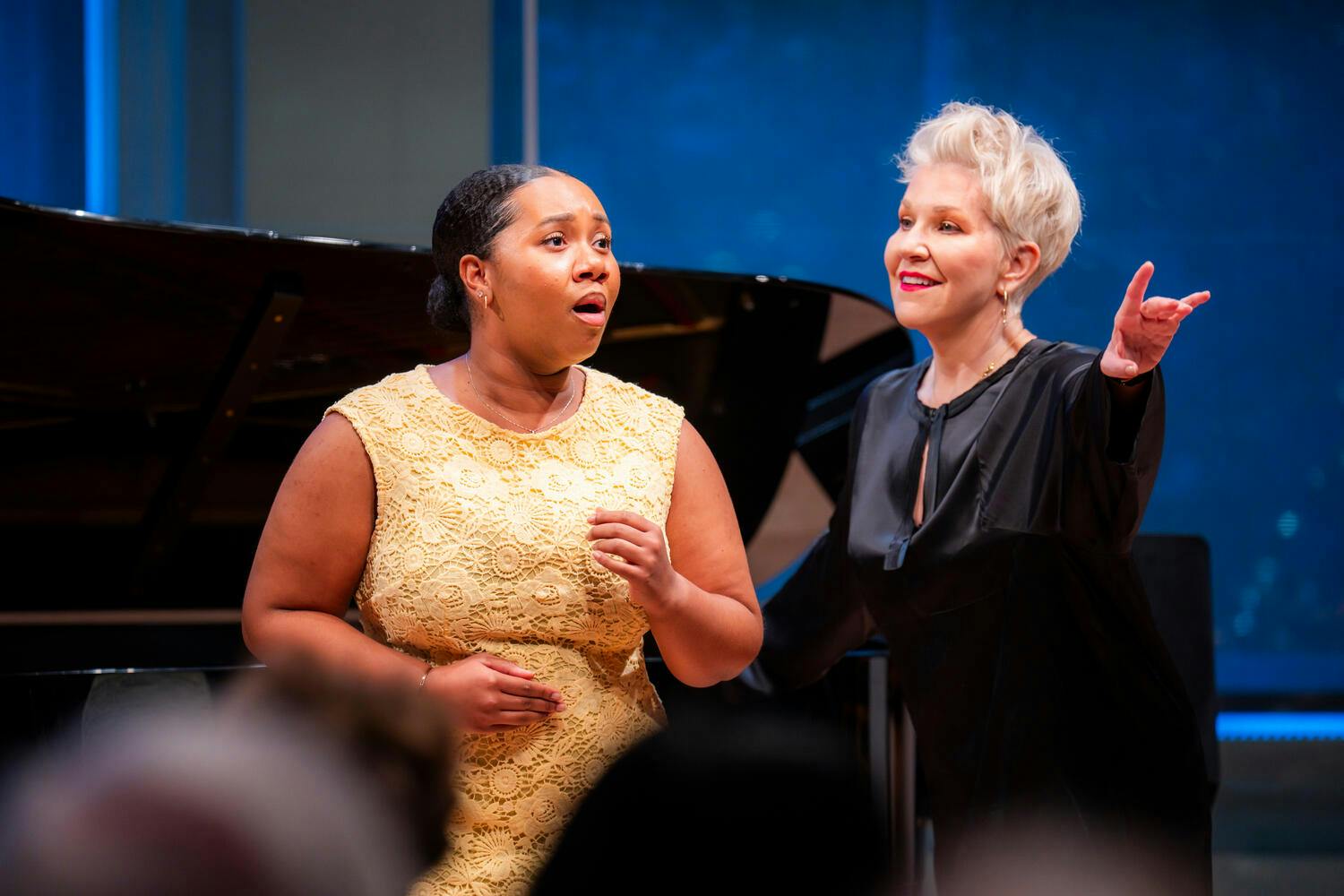 Joyce DiDonato coaching a student in a master class at Carnegie Hall.