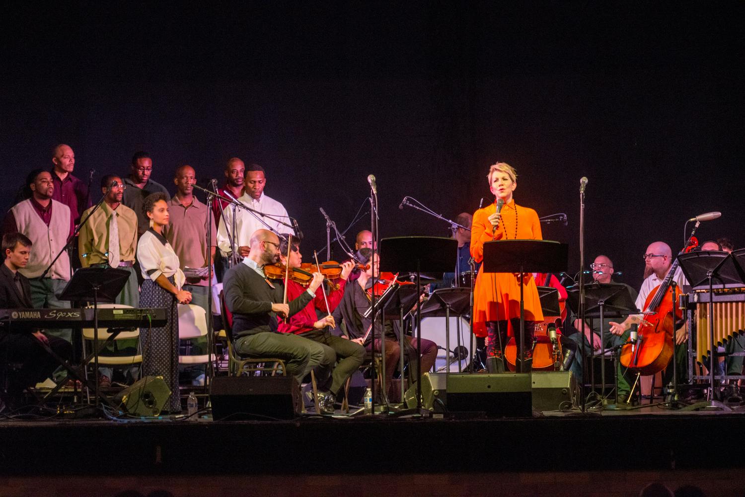 Joyce DiDonato, a string quintet, and a small choir performing on stage