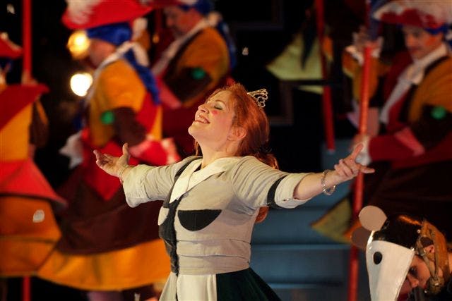 Joyce DiDonato on stage with open arms