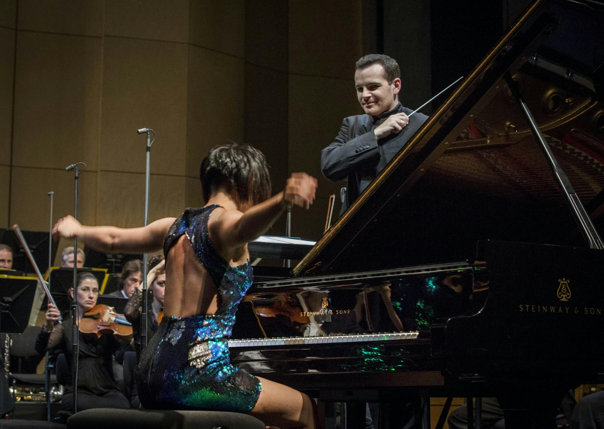 Lionel Bringuier conducting Yuja Wang playing the piano.