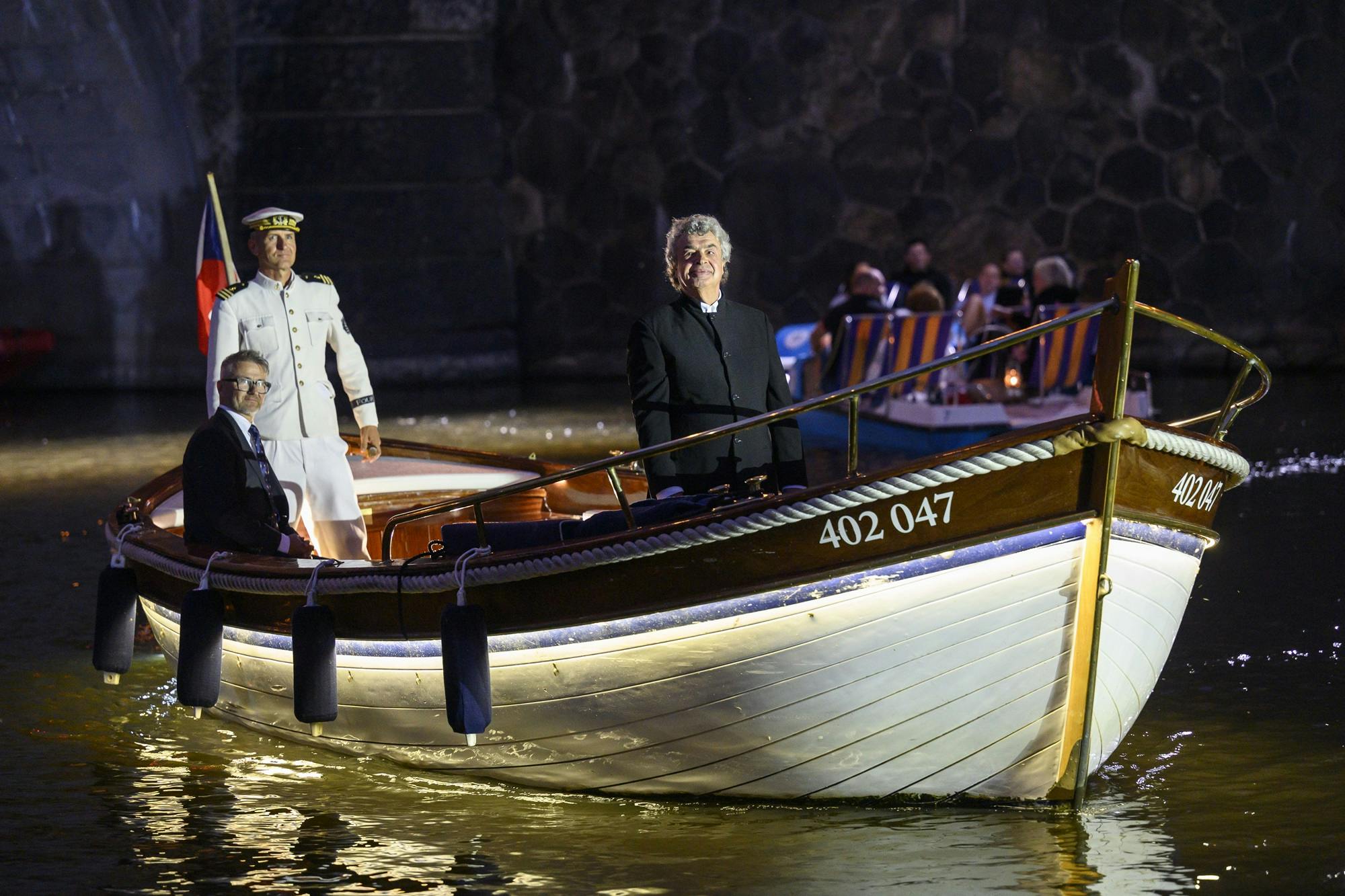 Semyon Bychkov and two others on a boat