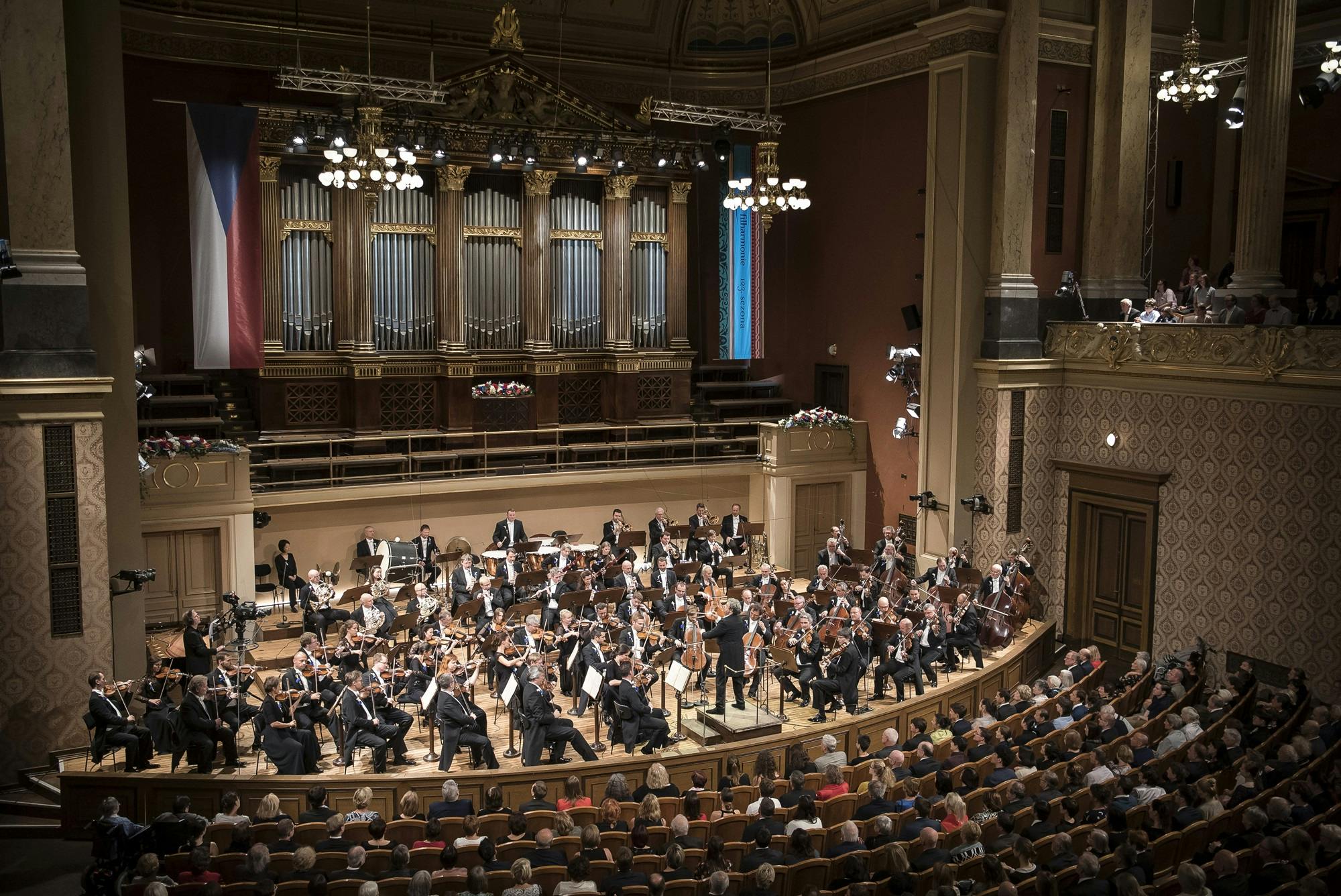 The Czech Philharmonic performing on stage