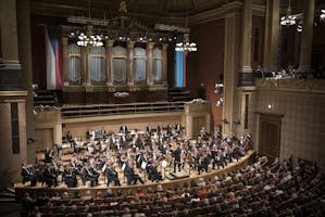 The Czech Philharmonic performing on stage