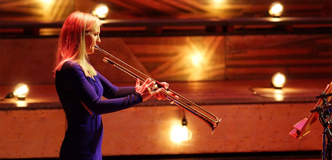 Alison Balsom playing a brass instrument