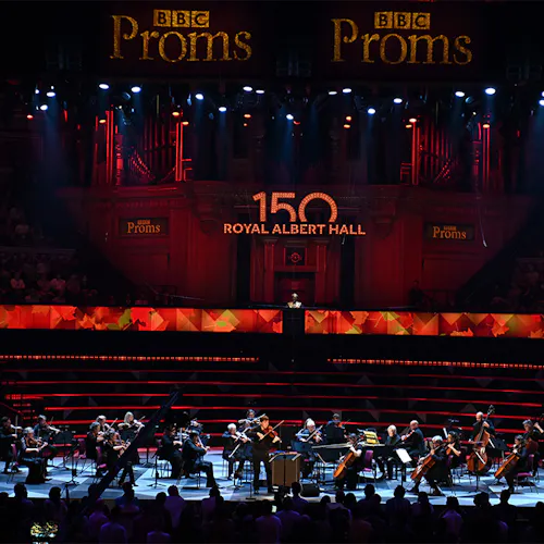 Joshua Bell and a string ensemble performing on stage