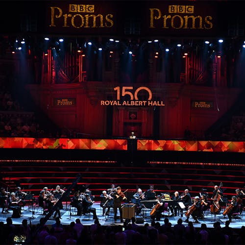 Joshua Bell and a string ensemble performing on stage