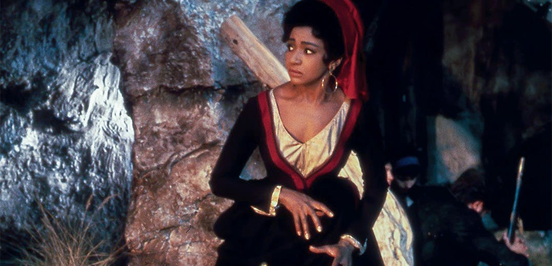 Grace Bumbry standing inside a cave