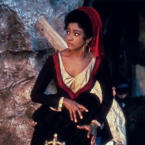 Grace Bumbry standing inside a cave