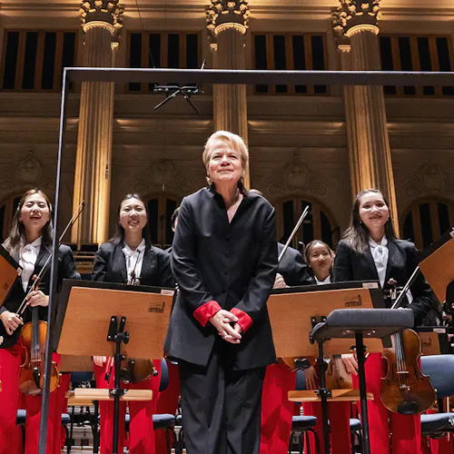 Marin Alsop and members of NYO-USA standing on stage