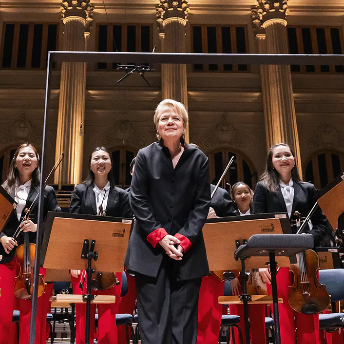 Marin Alsop and members of NYO-USA standing on stage